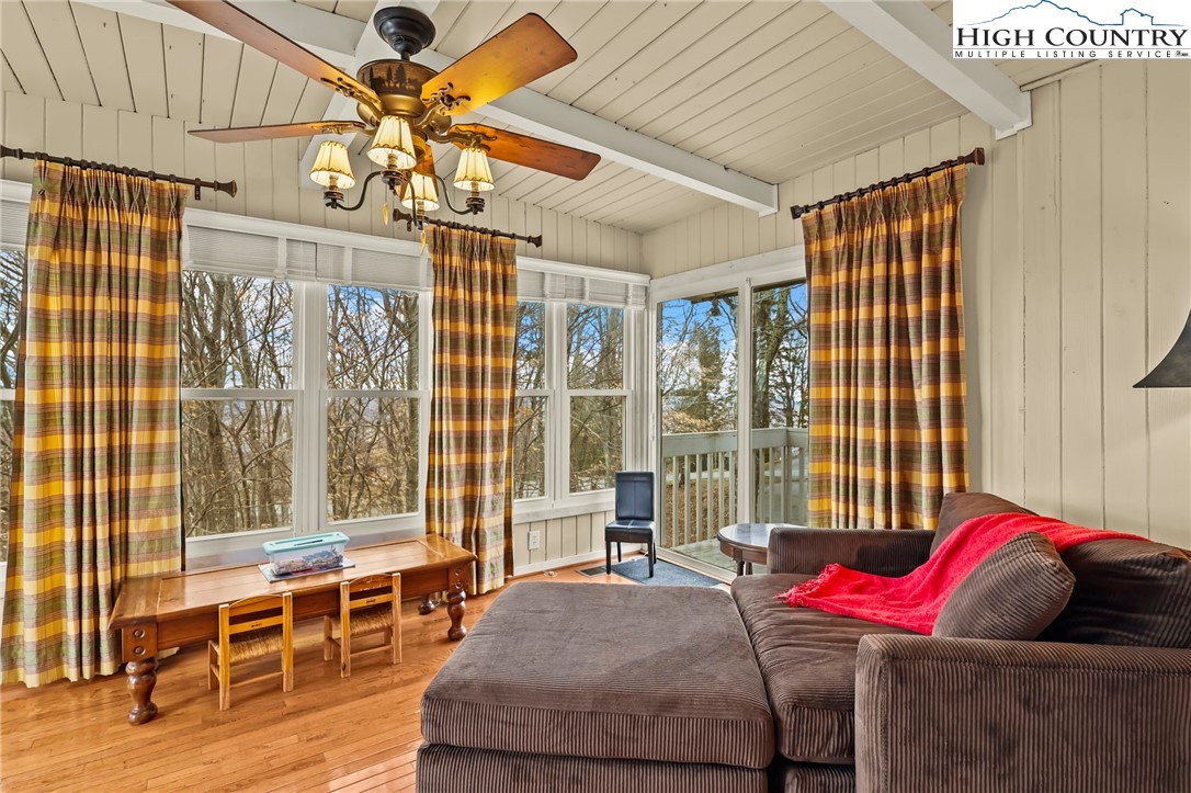207 Pinnacle Ridge Road Beech Mountain, NC 28604 - Photo 17 of 48 a bedroom with a bed and a window