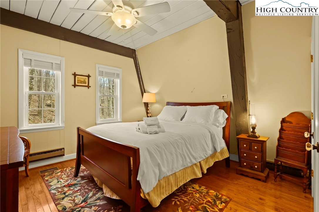 207 Pinnacle Ridge Road Beech Mountain, NC 28604 - Photo 24 of 48 a bedroom with double bed and a window