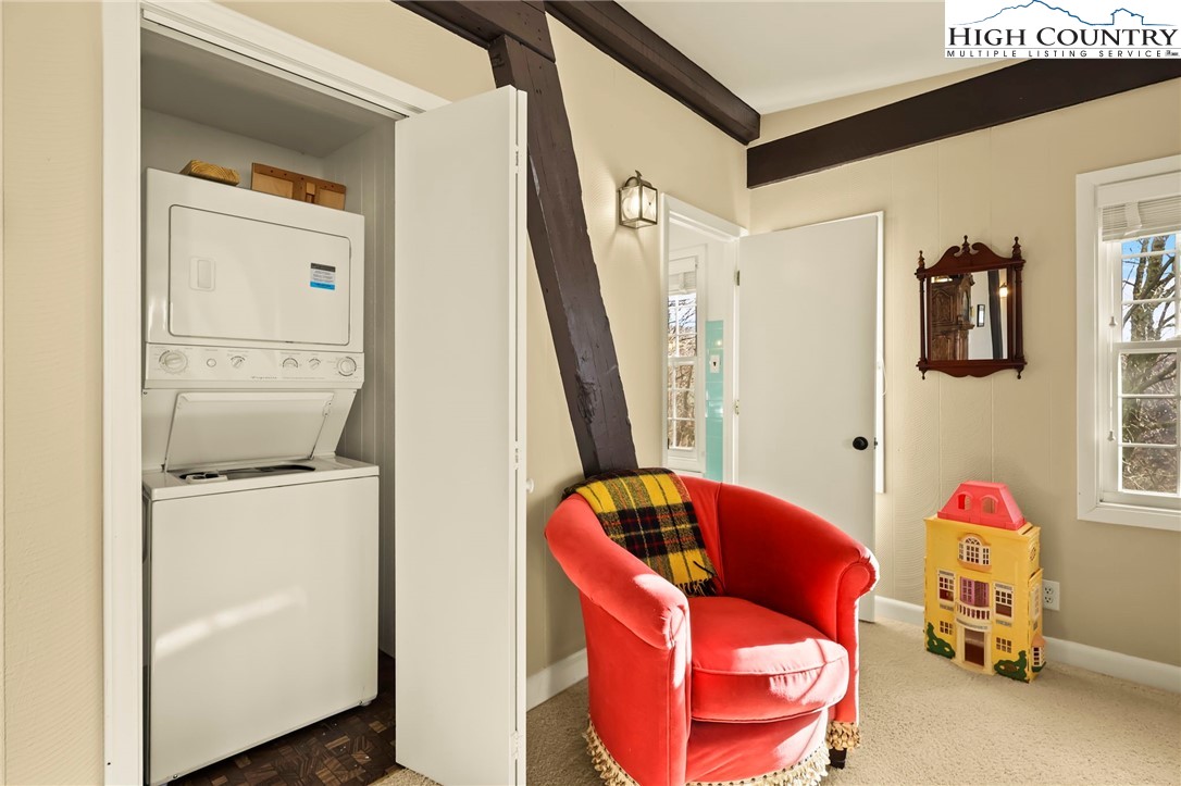 207 Pinnacle Ridge Road Beech Mountain, NC 28604 - Photo 36 of 48 a view of walk in closet with clothes and shoes