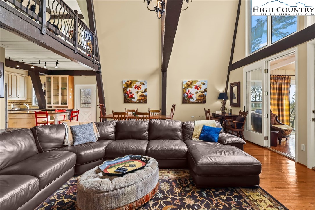 207 Pinnacle Ridge Road Beech Mountain, NC 28604 - Photo 10 of 48 a living room with furniture and a large window