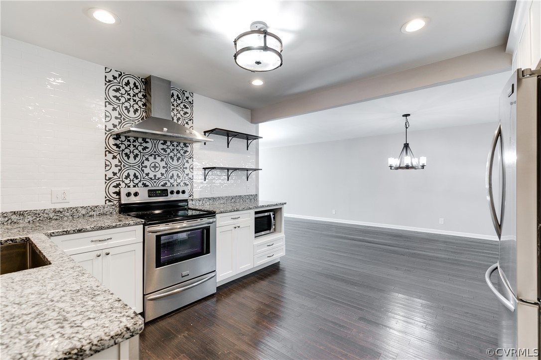 2100 Burgess Road Chester, VA 23836 - Photo 11 of 43 a kitchen with stainless steel appliances granite countertop a stove a sink and a refrigerator