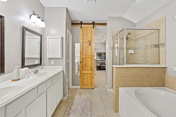 a outdoor living space with patio furniture and a fireplace