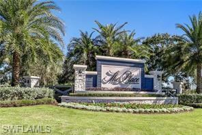 19828 The Pl Boulevard Estero, FL 33928 - Photo 21 of 37 a front view of a house with a garden