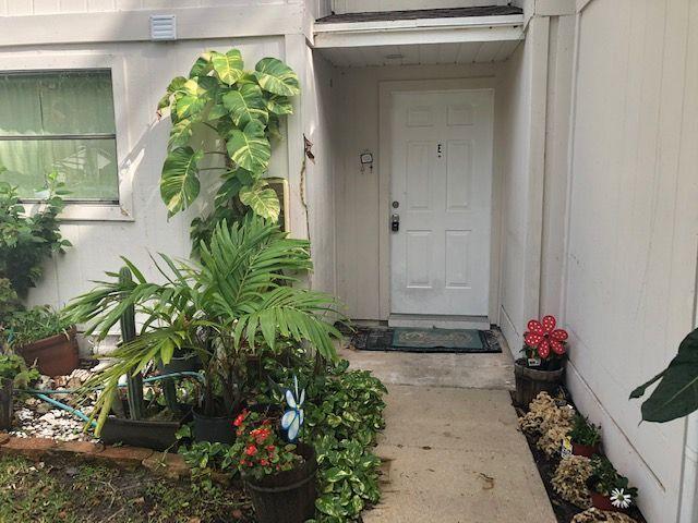5310 Elmhurst Road, Unit E West Palm Beach, FL 33417 - Photo 1 of 24 Front Door Of Unit