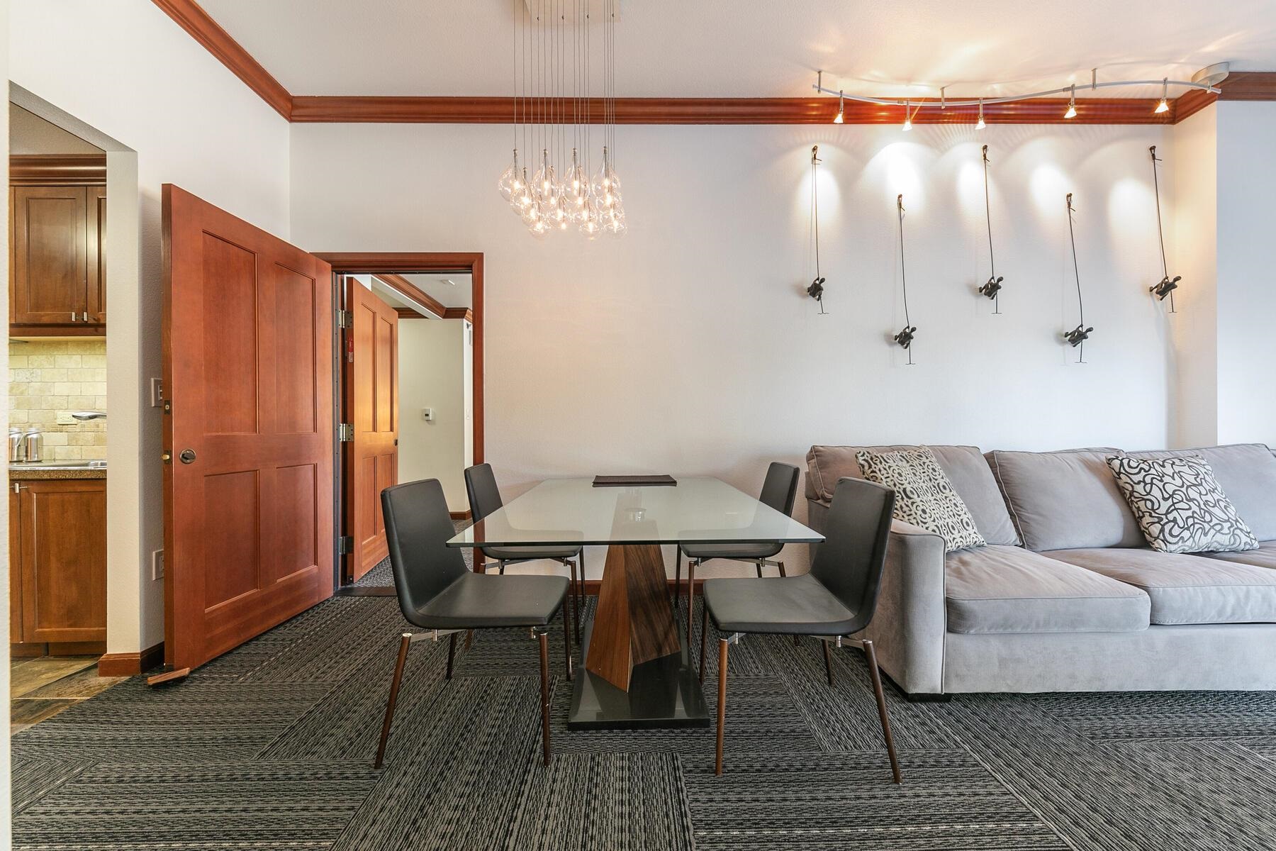 400 Resort Road, Unit 118 120 Olympic Valley, CA 96146 - Photo 13 of 27 a living room with furniture a wooden floor and next to a window