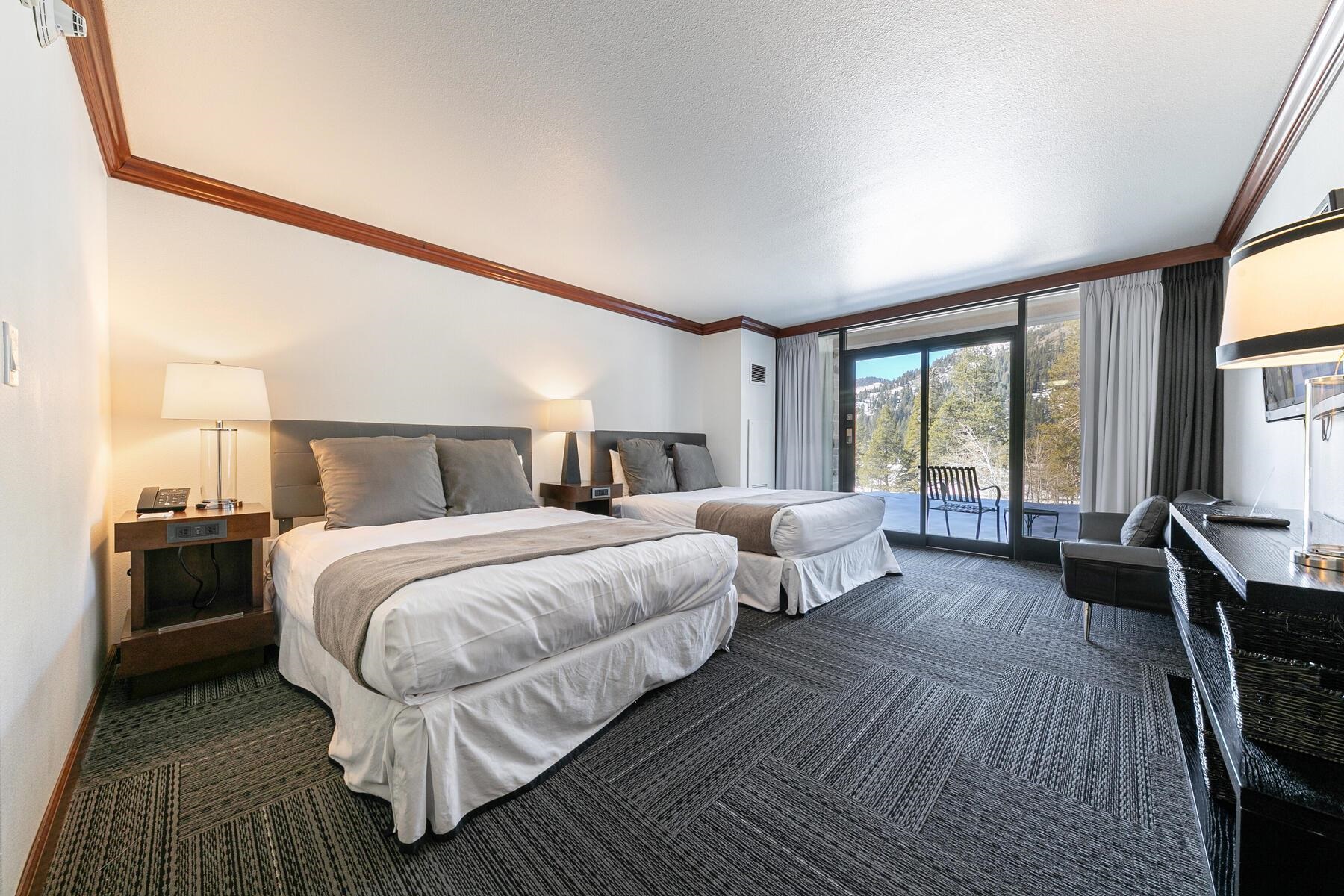 400 Resort Road, Unit 118 120 Olympic Valley, CA 96146 - Photo 19 of 27 a bedroom with bed and large window