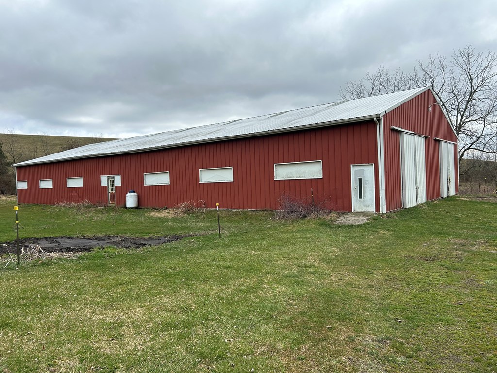 478 Moggey Road Sligo, PA 16255 - Photo 2 of 34 a front view of house with yard and a garden