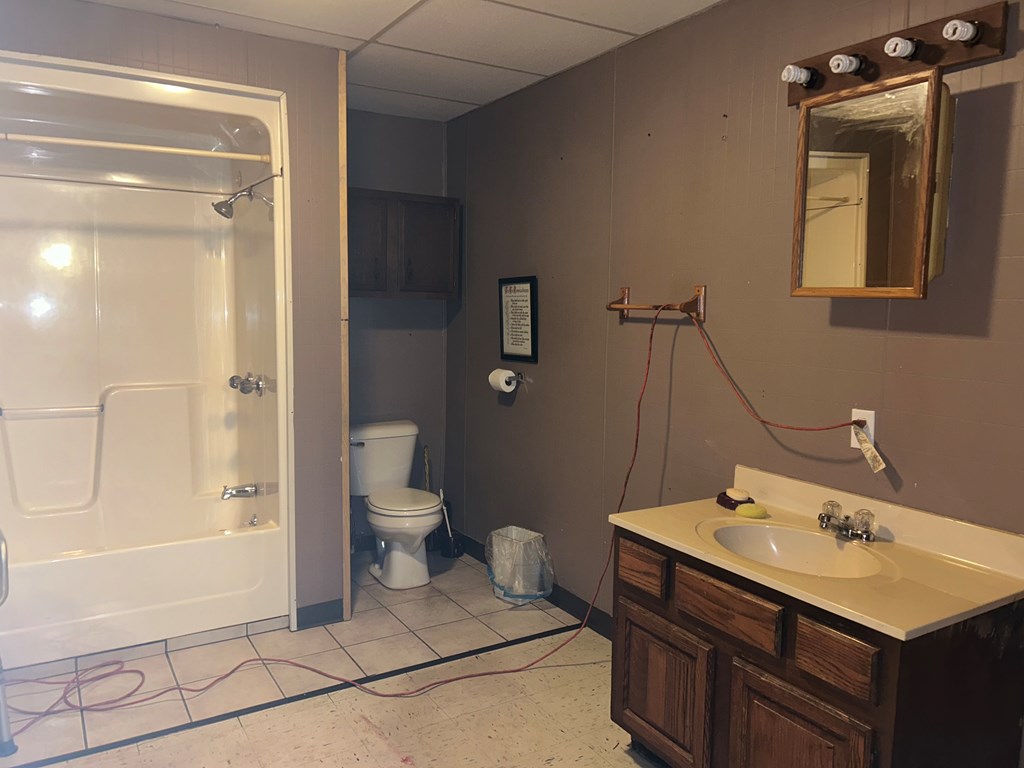 478 Moggey Road Sligo, PA 16255 - Photo 9 of 34 a bathroom with a sink a toilet and shower