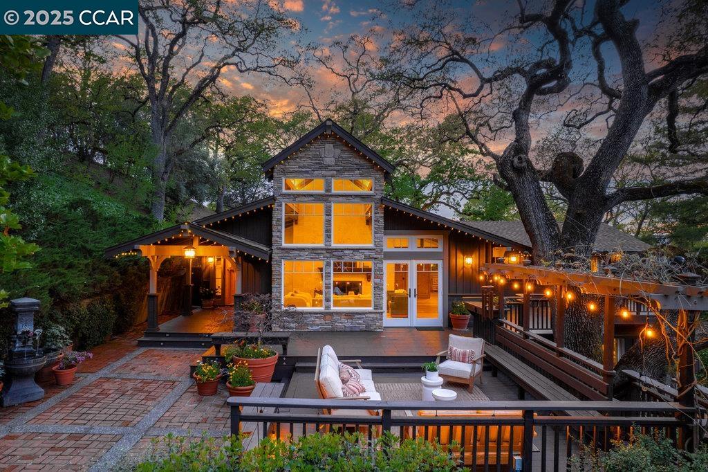 1111 Stone Valley Road Alamo, CA 94507 - Photo 1 of 47 a front view of house with yard outdoor seating and covered with trees