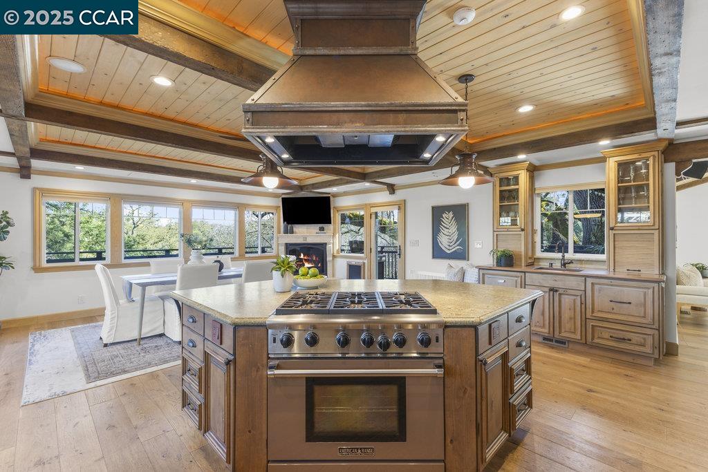 1111 Stone Valley Road Alamo, CA 94507 - Photo 11 of 47 a stove top oven sitting inside of a kitchen