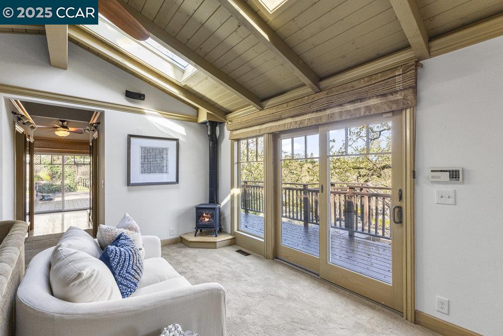 1111 Stone Valley Road Alamo, CA 94507 - Photo 18 of 47 a living room with furniture and a large window