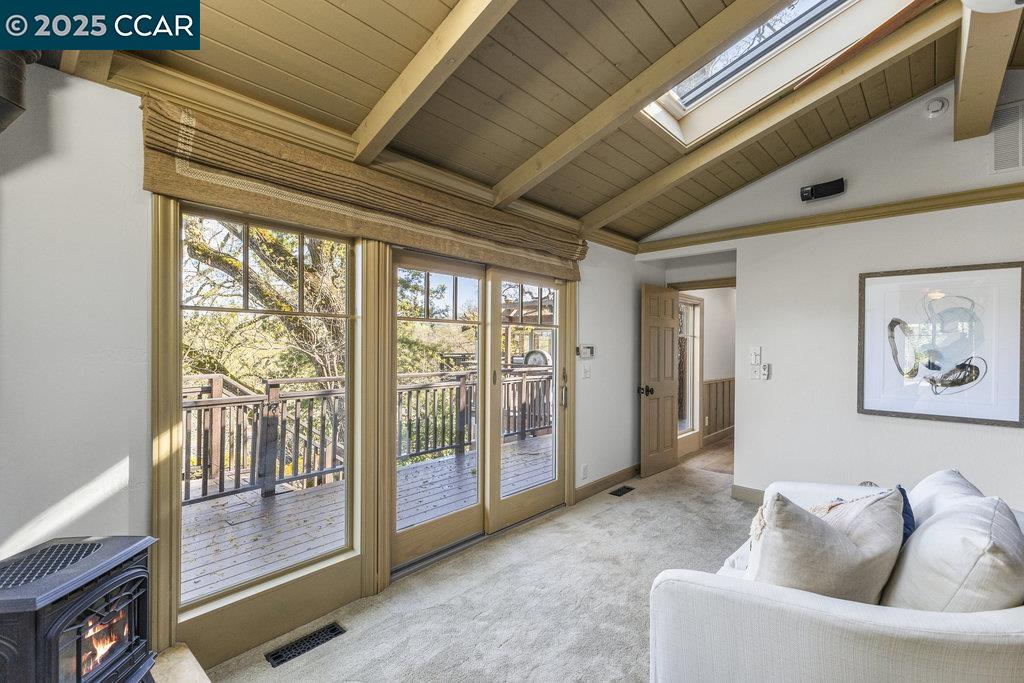 1111 Stone Valley Road Alamo, CA 94507 - Photo 19 of 47 a living room with furniture and a large window