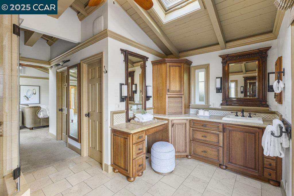 1111 Stone Valley Road Alamo, CA 94507 - Photo 22 of 47 a kitchen with a sink and wooden cabinets