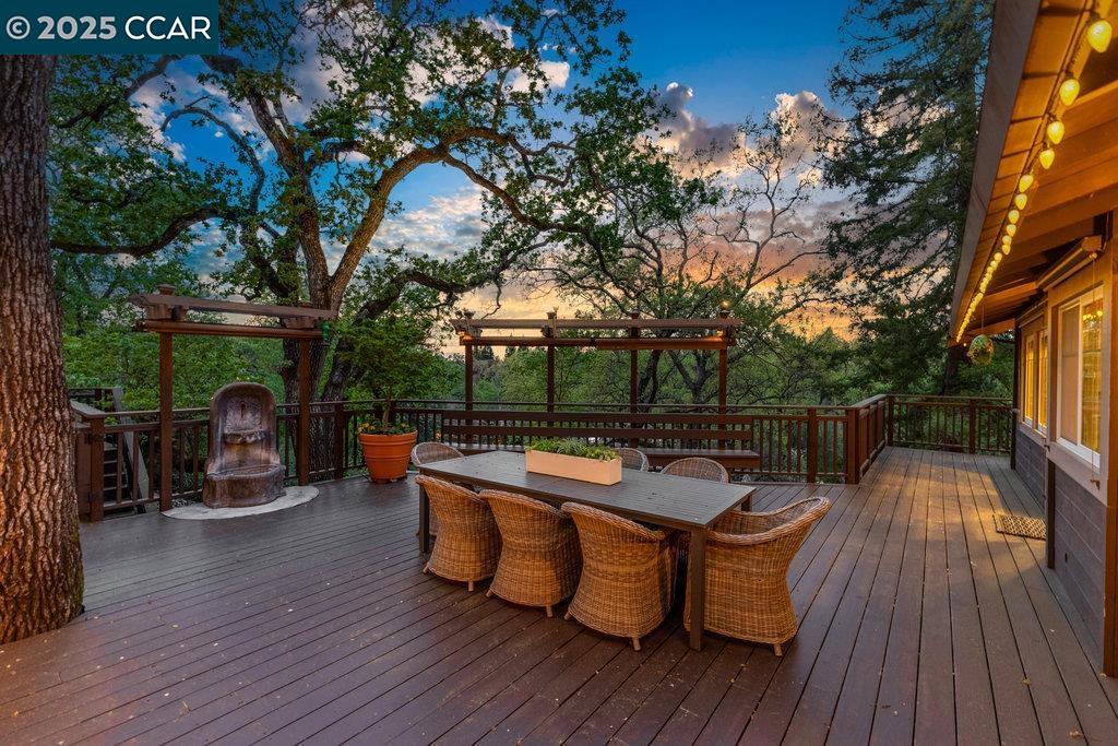 1111 Stone Valley Road Alamo, CA 94507 - Photo 30 of 47 an outdoor sitting area with furniture and wooden floor