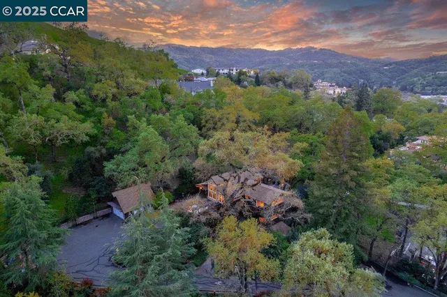 an aerial view of residential house with outdoor space
