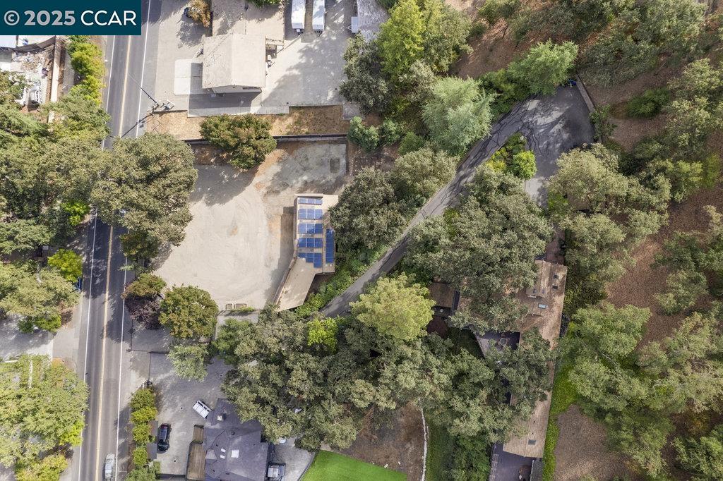 1111 Stone Valley Road Alamo, CA 94507 - Photo 35 of 47 an aerial view of a house with a yard and garden