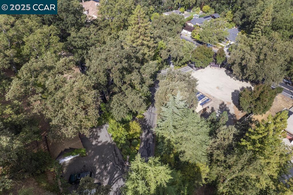 1111 Stone Valley Road Alamo, CA 94507 - Photo 37 of 47 a aerial view of a house with a yard and covered with swimming pool