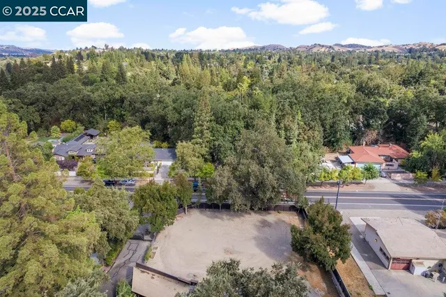 a view of a lot of trees and houses