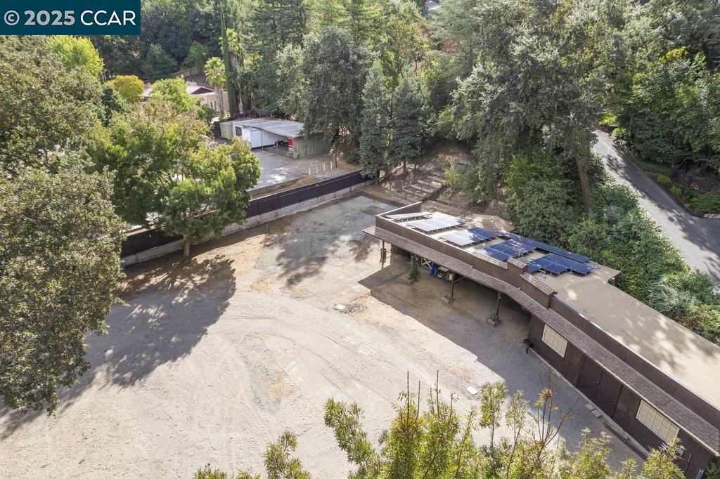 1111 Stone Valley Road Alamo, CA 94507 - Photo 43 of 47 a view of a backyard with chairs and a table