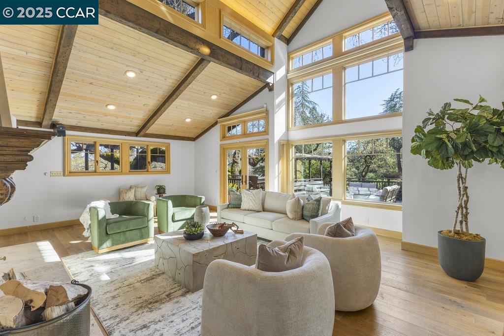 1111 Stone Valley Road Alamo, CA 94507 - Photo 7 of 47 a living room with furniture and a large window