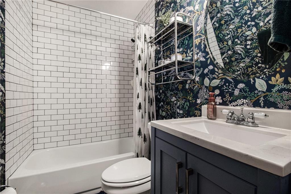 1639 Frazier Road Decatur, GA 30033 - Photo 18 of 30 a bathroom with a sink toilet and shower