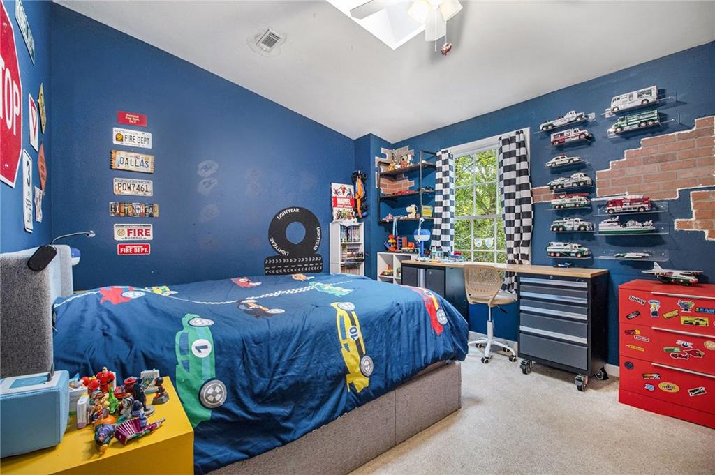 1639 Frazier Road Decatur, GA 30033 - Photo 19 of 30 a bedroom with a bed and a window