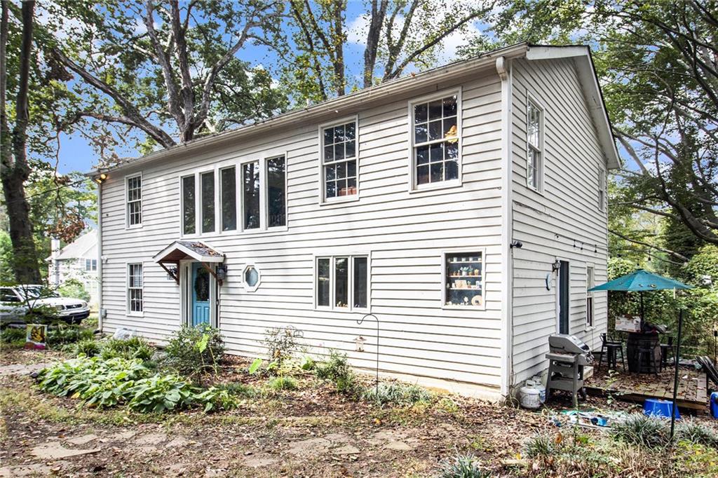 1639 Frazier Road Decatur, GA 30033 - Photo 2 of 30 a front view of a house with garden