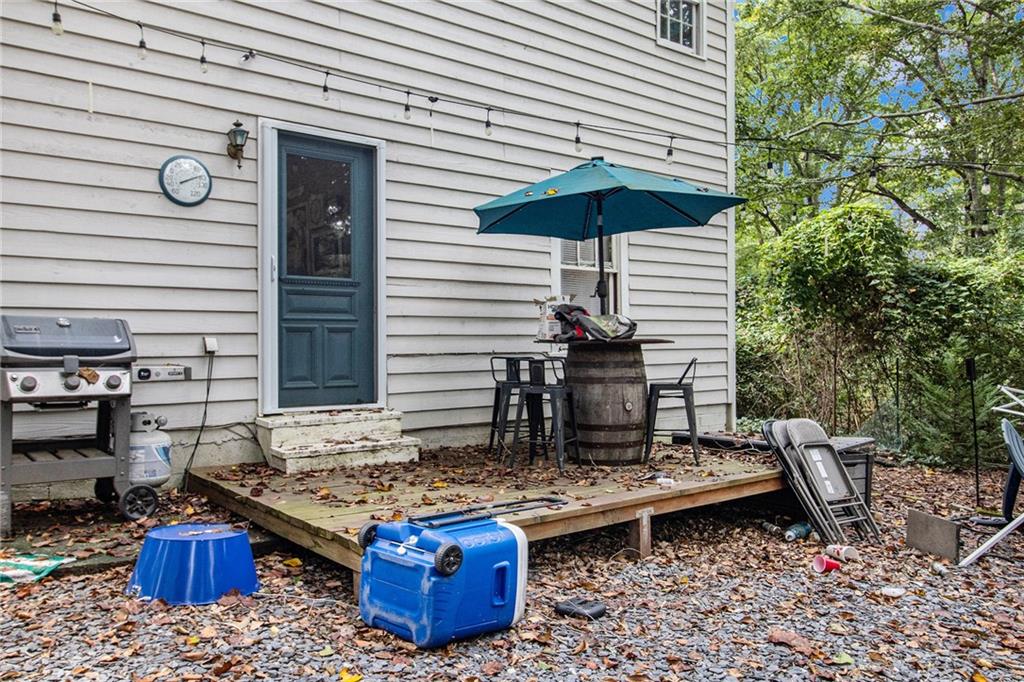 1639 Frazier Road Decatur, GA 30033 - Photo 25 of 30 a view of a backyard with chairs and a table
