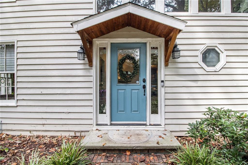 1639 Frazier Road Decatur, GA 30033 - Photo 3 of 30 a front view of a house with a yard