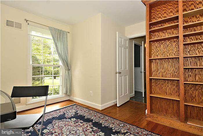 15701 Tierra Drive Silver Spring, MD 20906 - Photo 16 of 30 Office/den with built-in oak book case.
