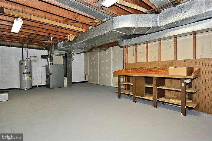 15701 Tierra Drive Silver Spring, MD 20906 - Photo 26 of 30 Lower level utility/workshop area.