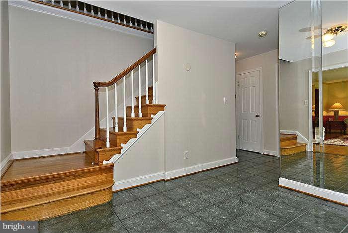 15701 Tierra Drive Silver Spring, MD 20906 - Photo 4 of 30 Foyer with tile and hardwood staircase