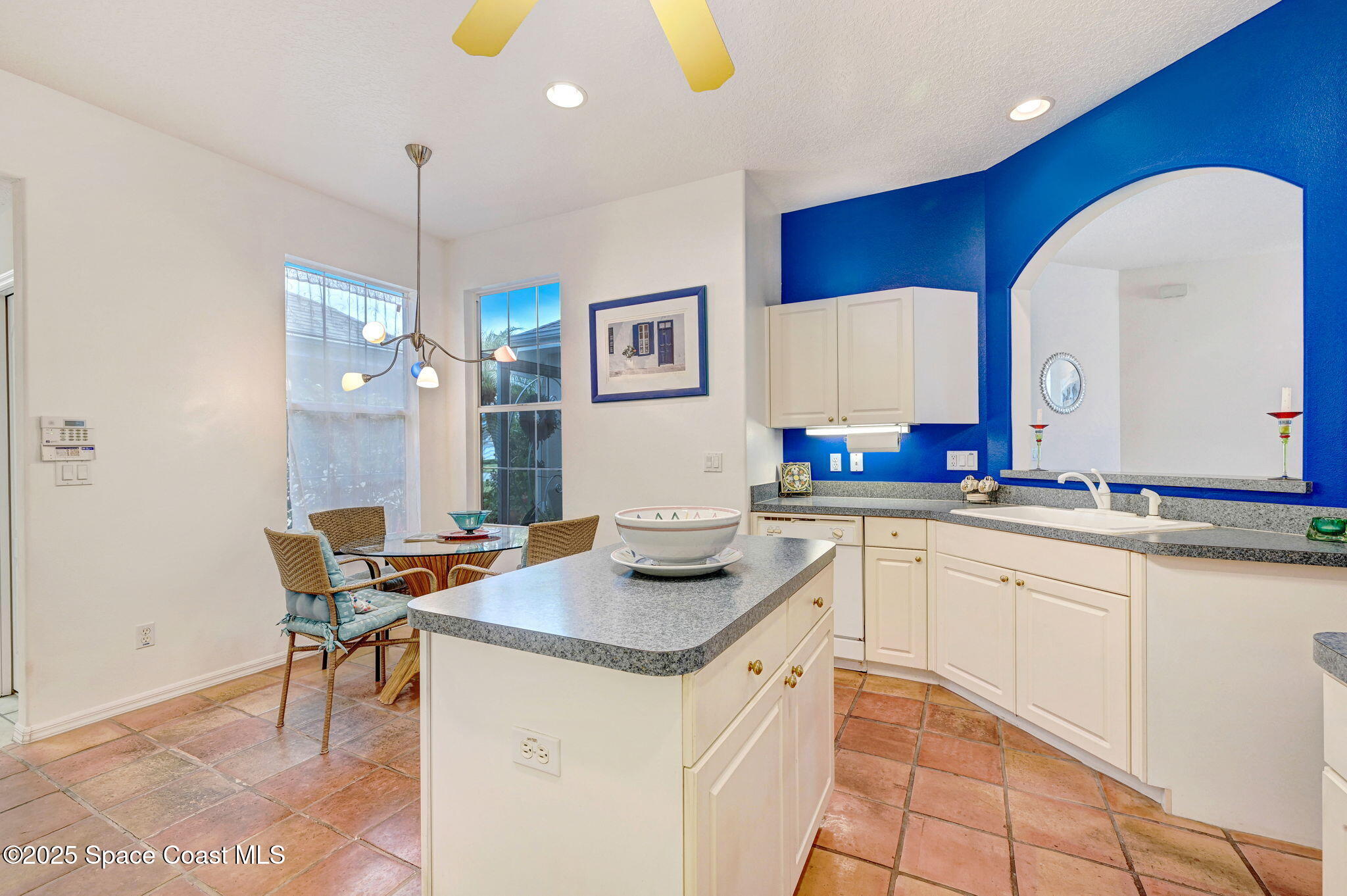 4341 Aberdeen Circle Rockledge, FL 32955 - Photo 14 of 43 a kitchen with stainless steel appliances granite countertop a sink and a counter space