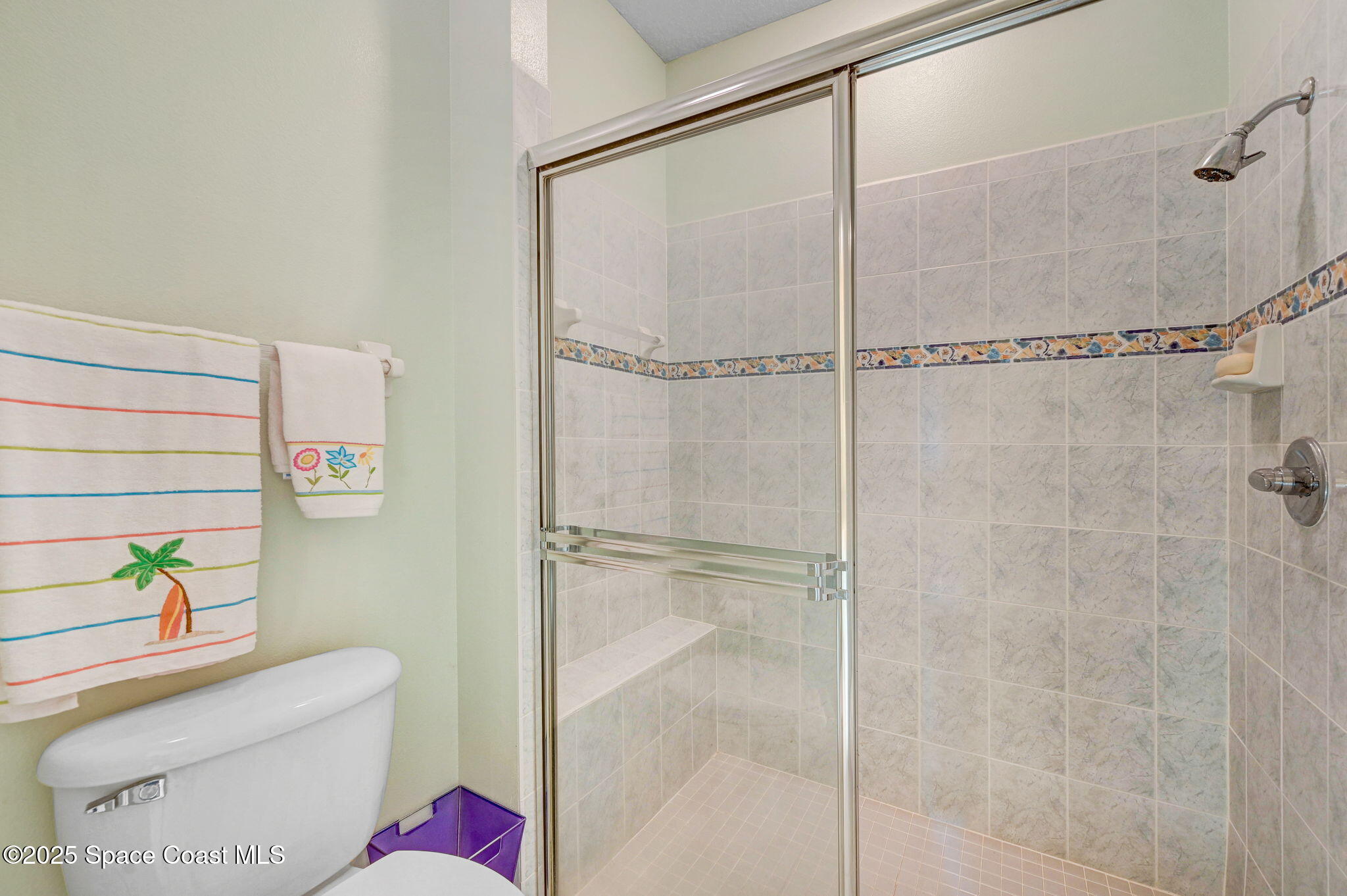 4341 Aberdeen Circle Rockledge, FL 32955 - Photo 26 of 43 a bathroom with a toilet and a shower