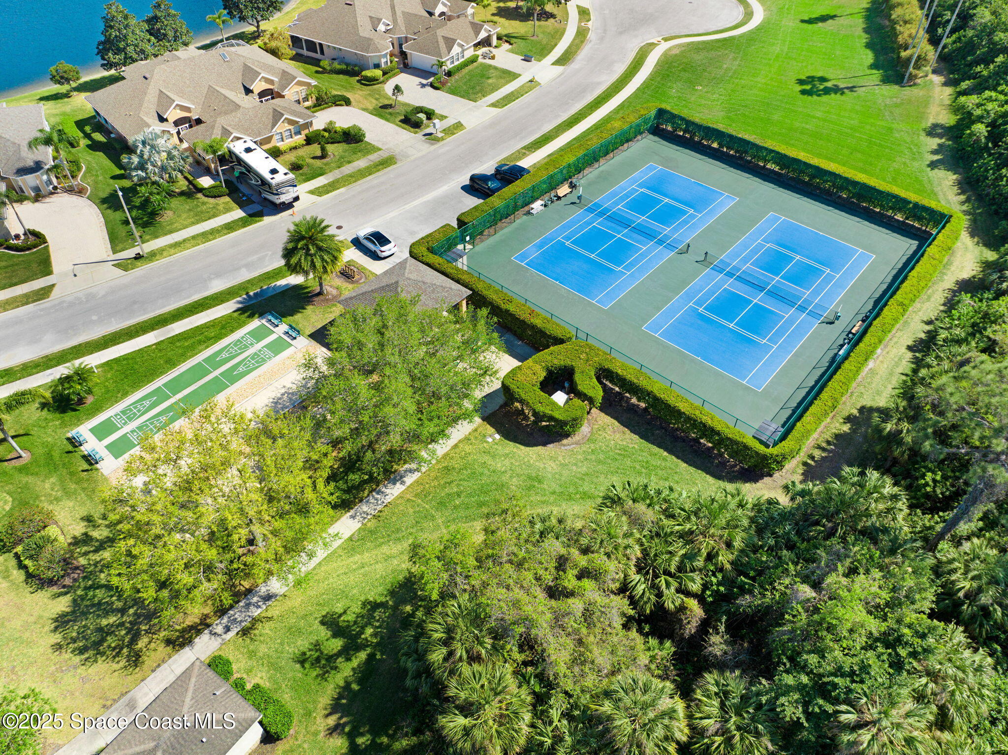4341 Aberdeen Circle Rockledge, FL 32955 - Photo 41 of 43 an aerial view of a backyard