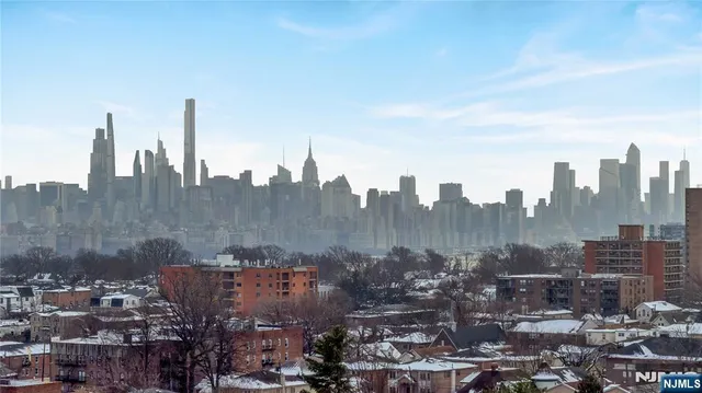 a view of a city with tall buildings
