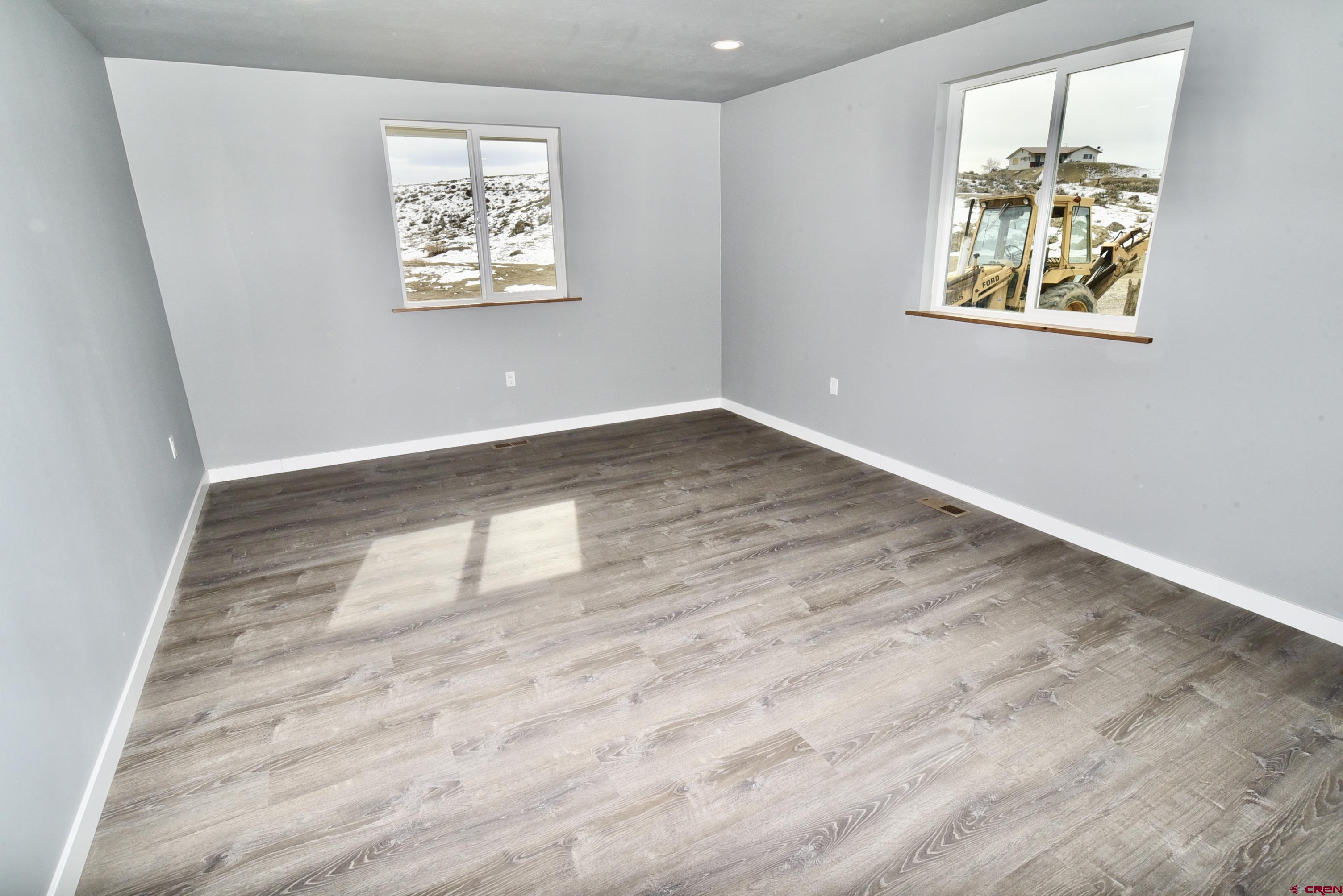 66462 Landfill Road Montrose, CO 81401 - Photo 20 of 30 a view of an empty room and window
