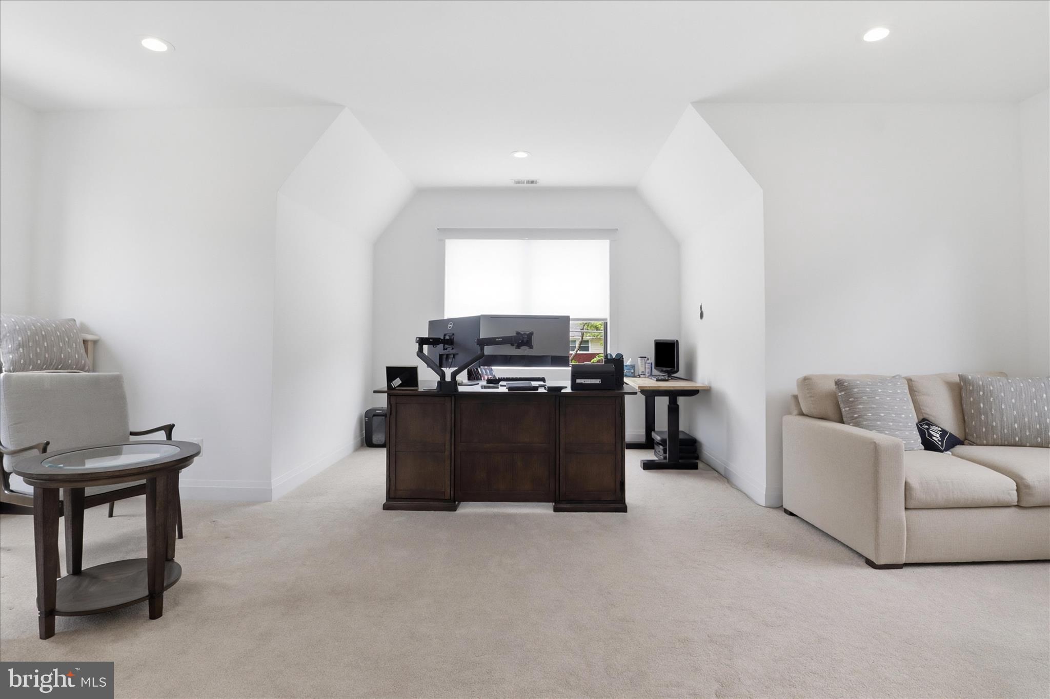 202 Branch Road Southeast Vienna, VA 22180 - Photo 41 of 59 a living room with furniture and a window