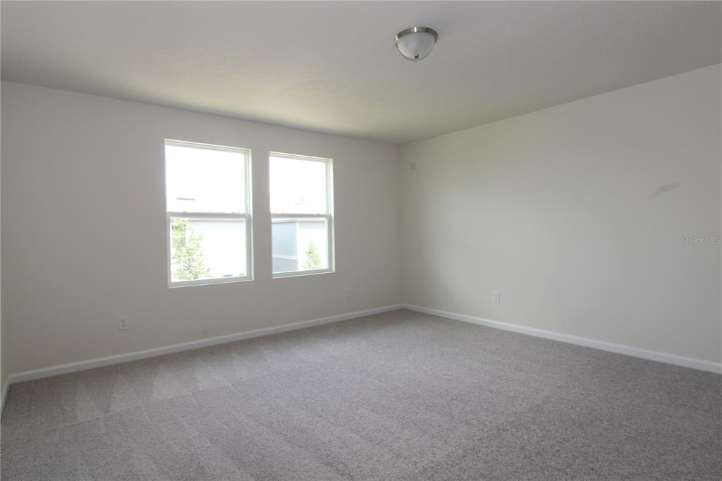2233 Litchfield Loop DeLand, FL 32720 - Photo 12 of 20 an empty room with a window
