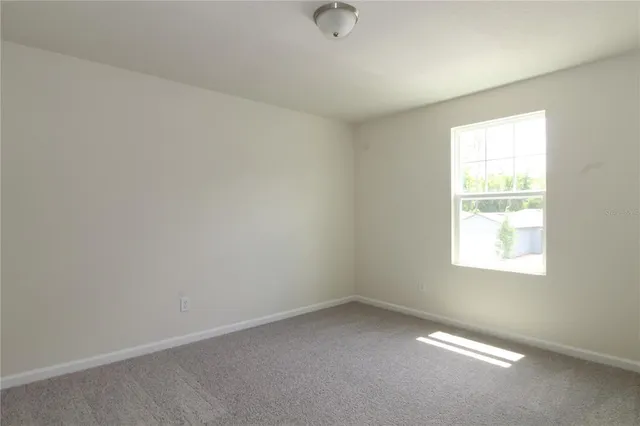 an empty room with a window