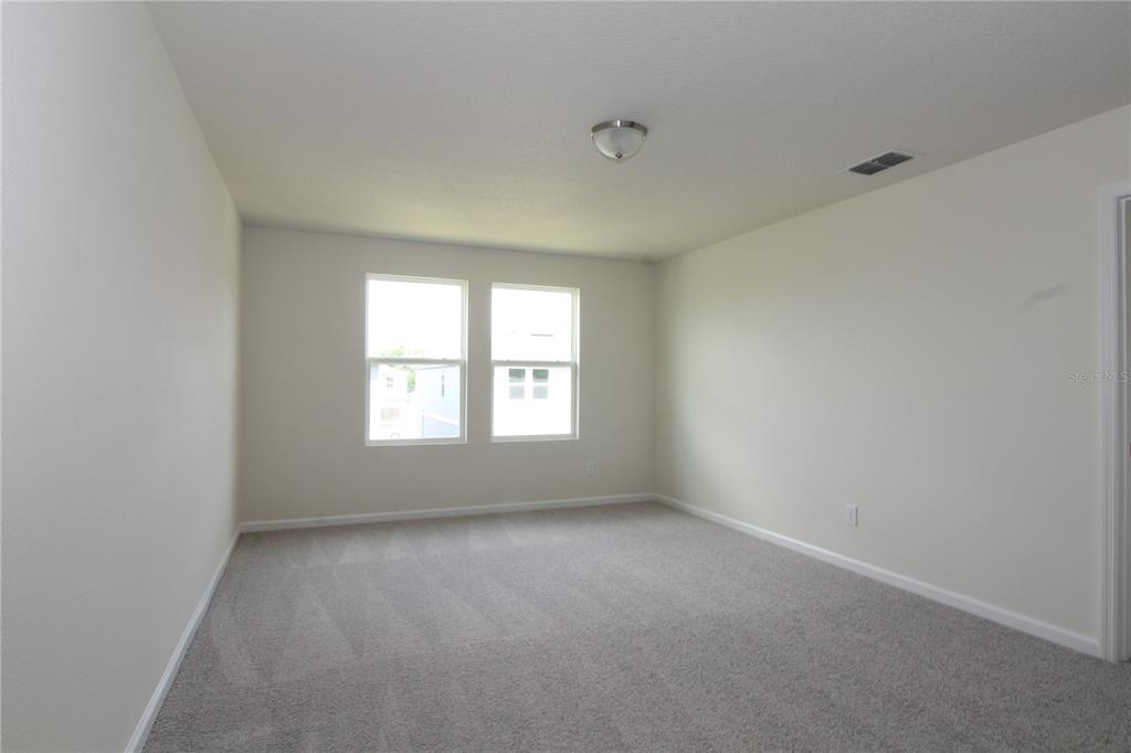 2233 Litchfield Loop DeLand, FL 32720 - Photo 10 of 20 an empty room with a window