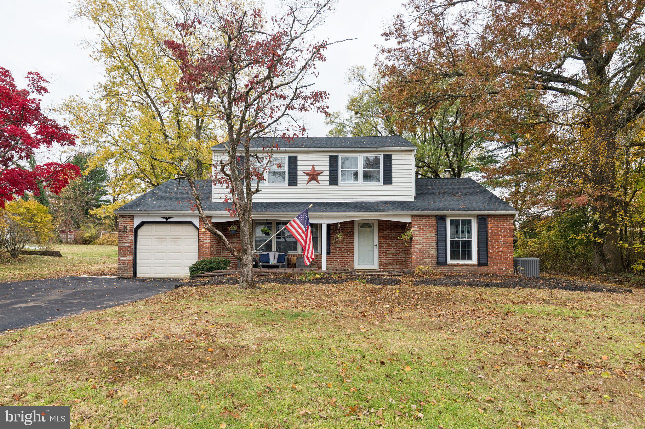 35 Buckwalter Road Eagleville, PA 19403 - Photo 1 of 54 a view of a house with a yard and large tree