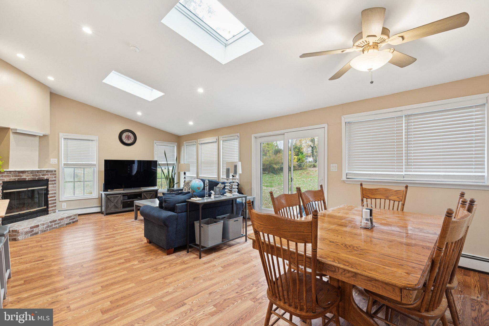 35 Buckwalter Road Eagleville, PA 19403 - Photo 11 of 54 a living room with furniture and a flat screen tv