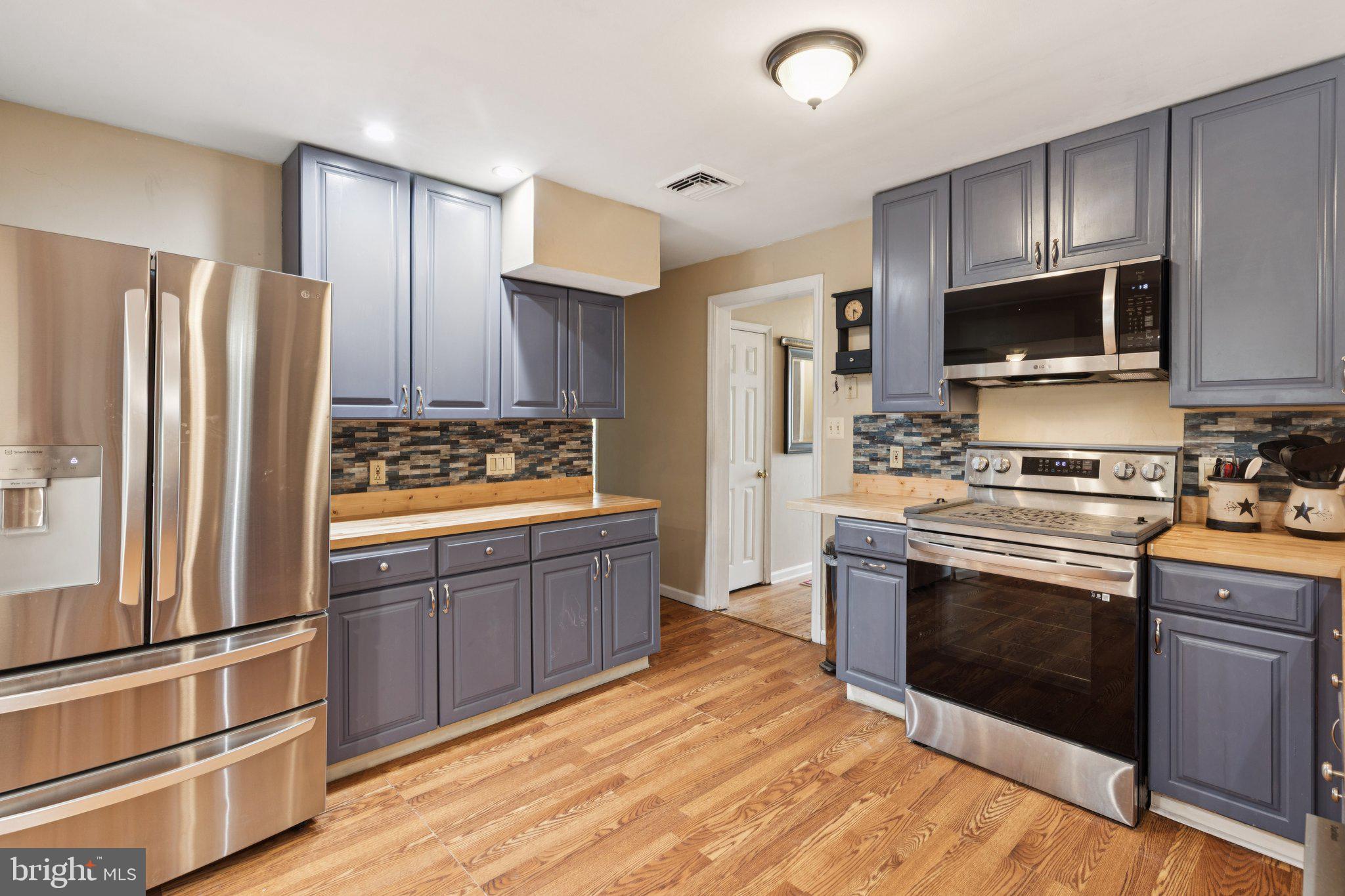 35 Buckwalter Road Eagleville, PA 19403 - Photo 20 of 54 a kitchen with stainless steel appliances granite countertop a refrigerator stove and sink