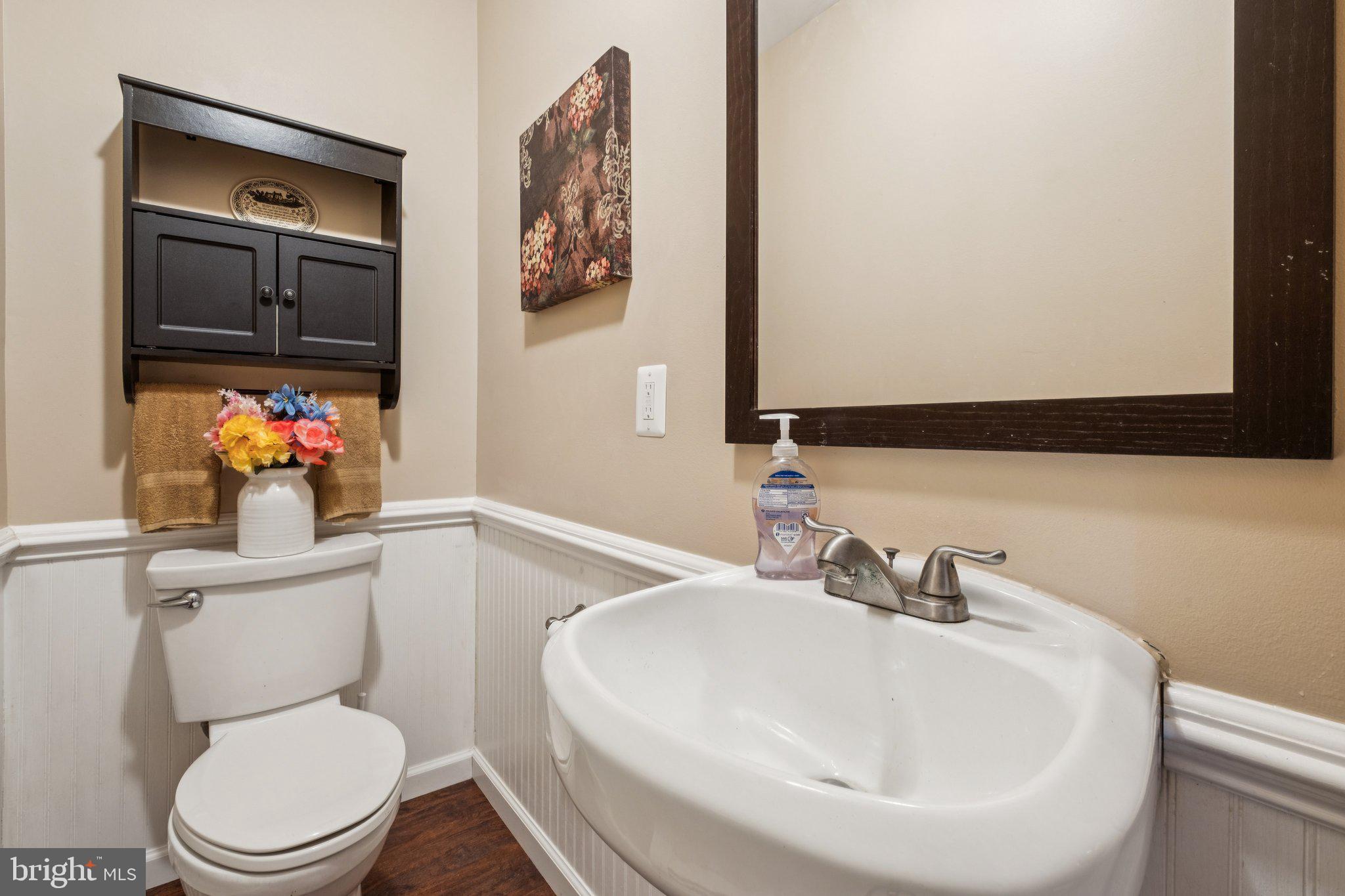 35 Buckwalter Road Eagleville, PA 19403 - Photo 44 of 54 a white toilet sitting next to a bathroom sink
