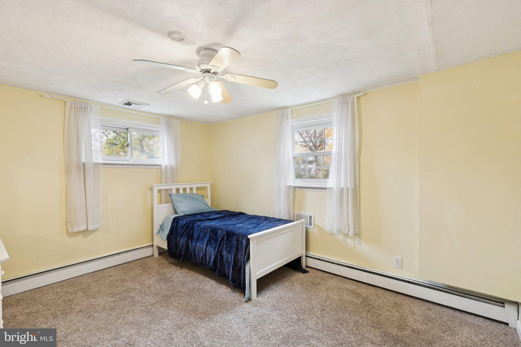 35 Buckwalter Road Eagleville, PA 19403 - Photo 47 of 54 a spacious bedroom with a bed and a window