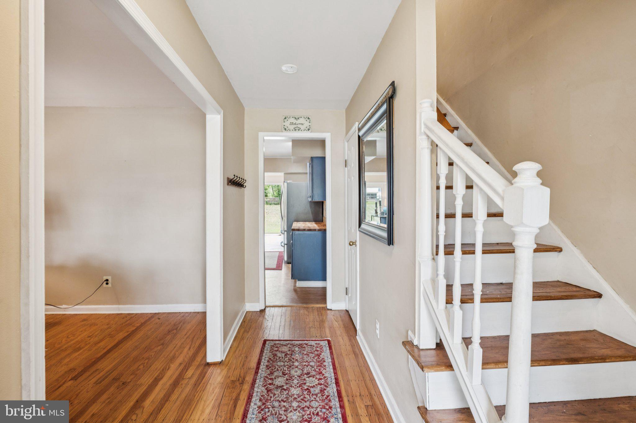 35 Buckwalter Road Eagleville, PA 19403 - Photo 8 of 54 a view of a hallway with wooden floor and staircase
