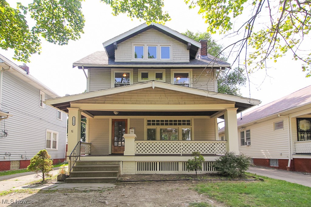 3198 West 112th Street Cleveland, OH 44111 - Photo 1 of 1 Traditional style home with a chimney and a porch