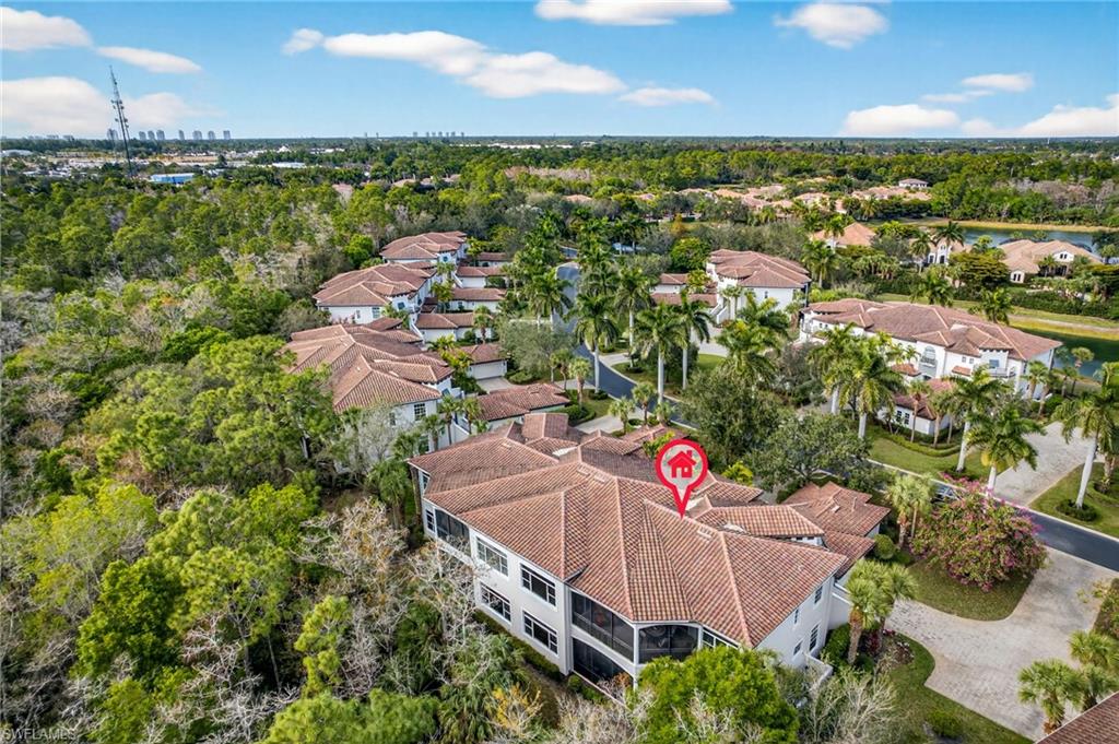 28540 Calabria Court, Unit 101 Naples, FL 34110 - Photo 29 of 41 Aerial overview of property's location featuring nearby suburban area