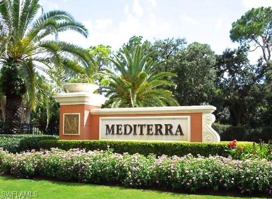 28540 Calabria Court, Unit 101 Naples, FL 34110 - Photo 32 of 41 View of community / neighborhood sign